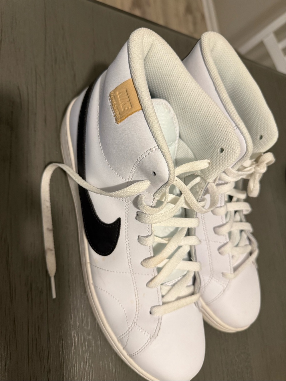 Nike Men’s White High-Top Sneakers with Black Swoosh